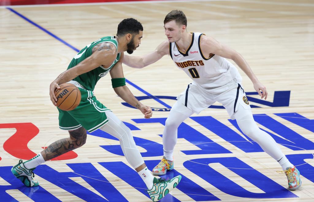 Jayson Tatum against Christian Braun.