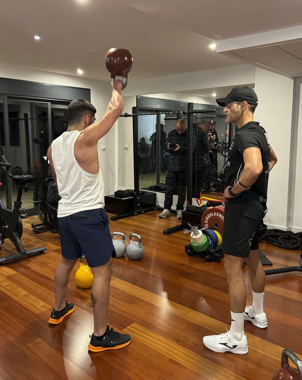 Trabalho do treinador e do atleta durante uma sessão.