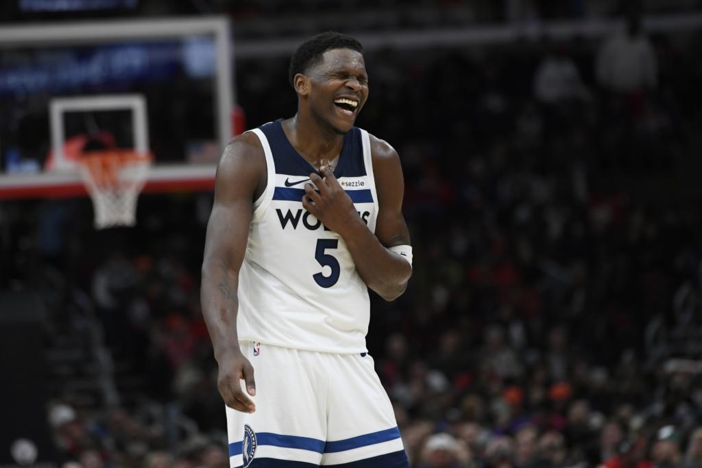 Minnesota Timberwolves' Anthony Edwards (5), celebrates during the final minutes of an NBA basketball game against the Chicago Bulls Thursday, Nov. 7, 2024, in Chicago. Minnesota won 135-119. (AP Photo/Paul Beaty)