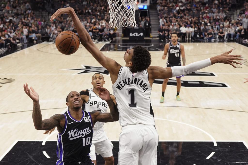 Wembanyama blocks DeRozan.