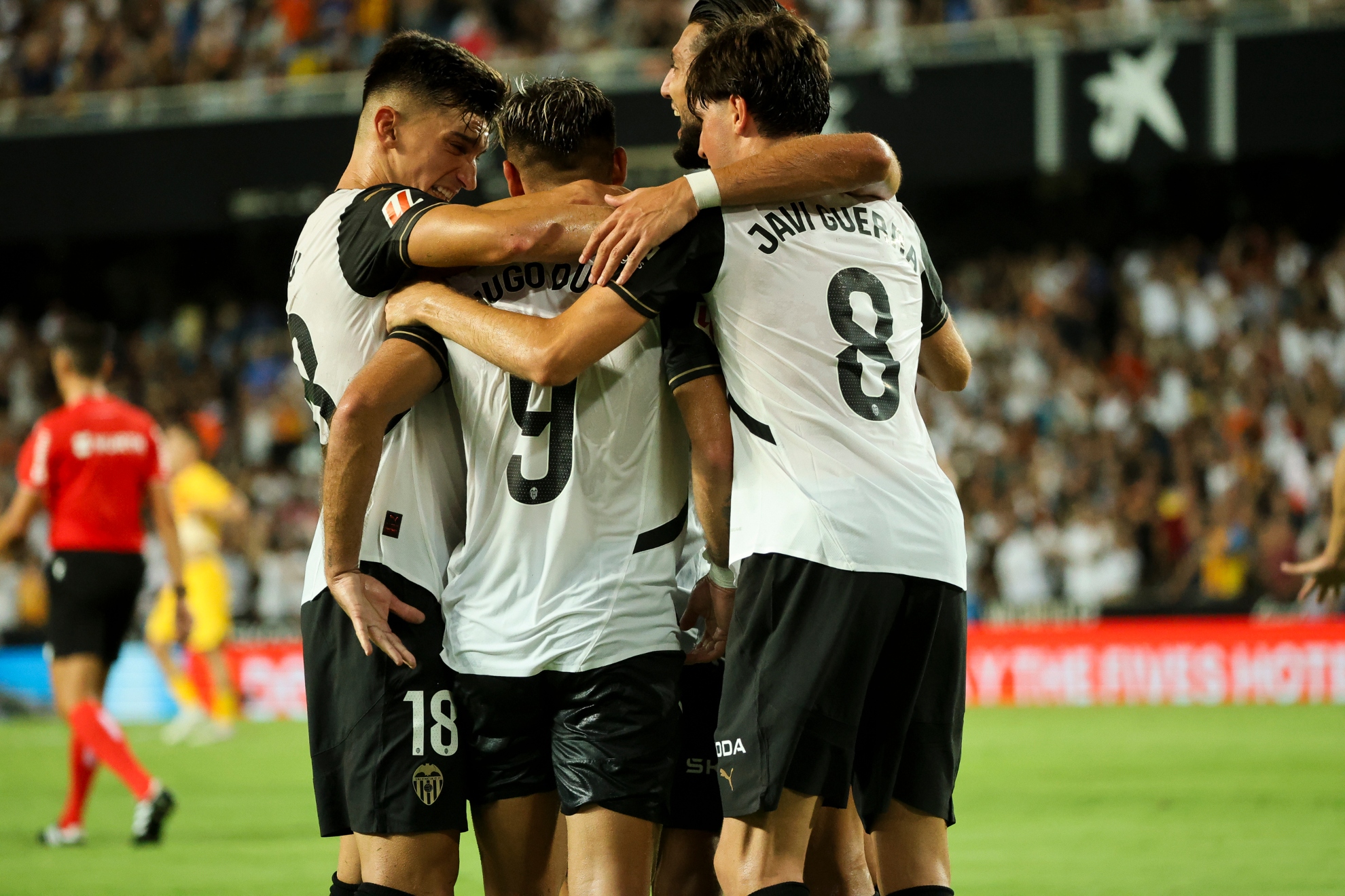 Jugadores del Valencia celebrando un gol.