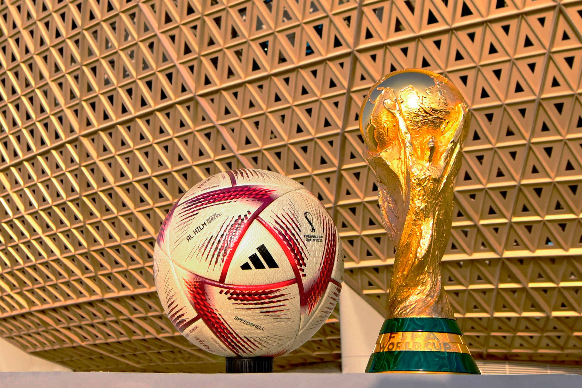 Image of the Official Ball of Qatar 2022 with the World Champion Trophy