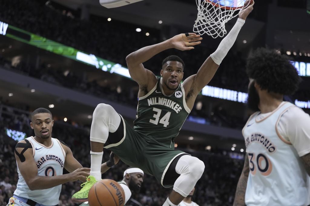 Milwaukee Bucks' Giannis Antetokounmpo dunks during the first half of an NBA basketball game Wednesday, Jan. 8, 2025, in Milwaukee. (AP Photo/Morry Gash)