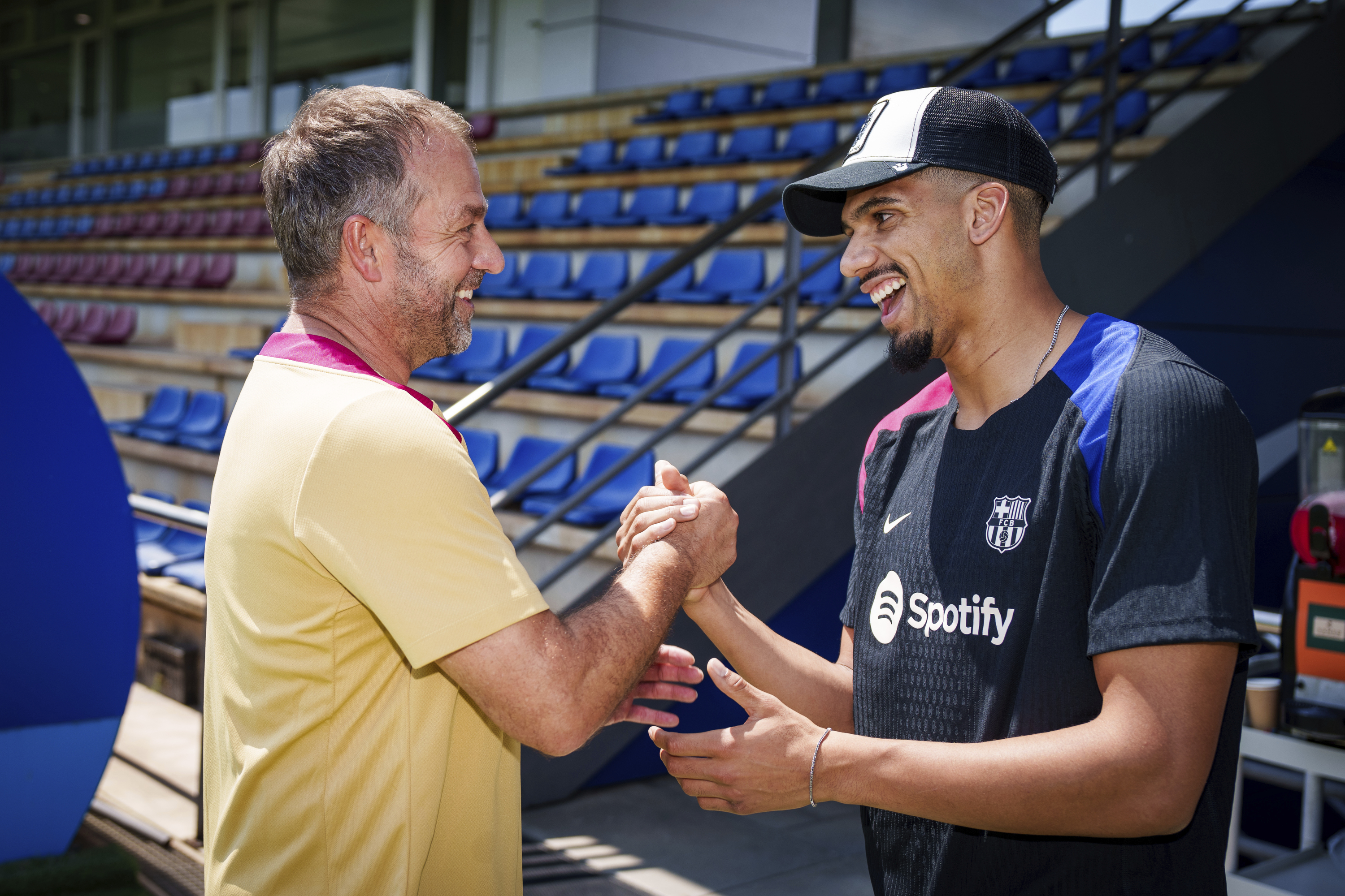 Flick and Araujo greet each other at the beginning of the season.