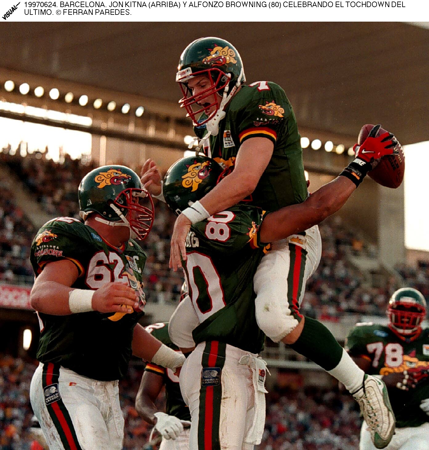 JON KITNA (ABOVE) AND ALFONZO BROWNING (80) CELEBRATING THE LAST TOUCHDOWN