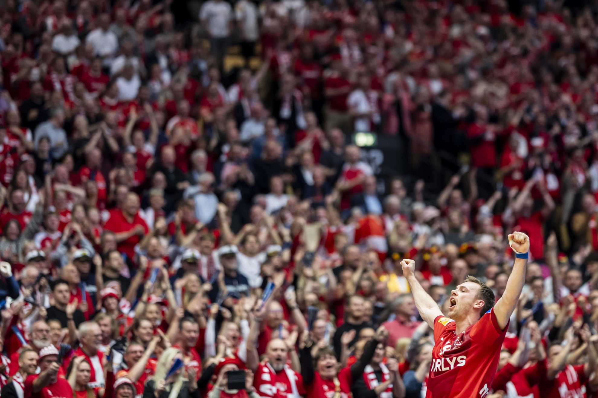Matthias Gidsel celebrates a victory for Denmark at the Jyske Bank Boxen in Herning.