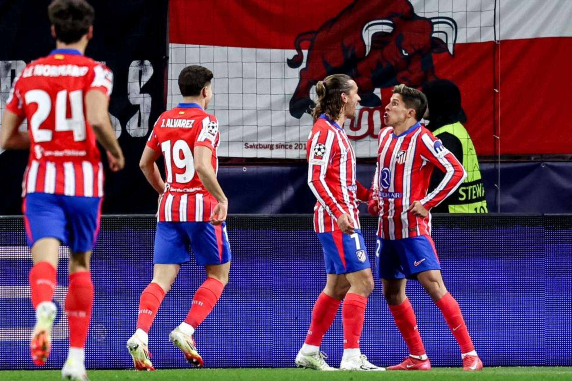 Giuliano celebrates a goal with his teammates