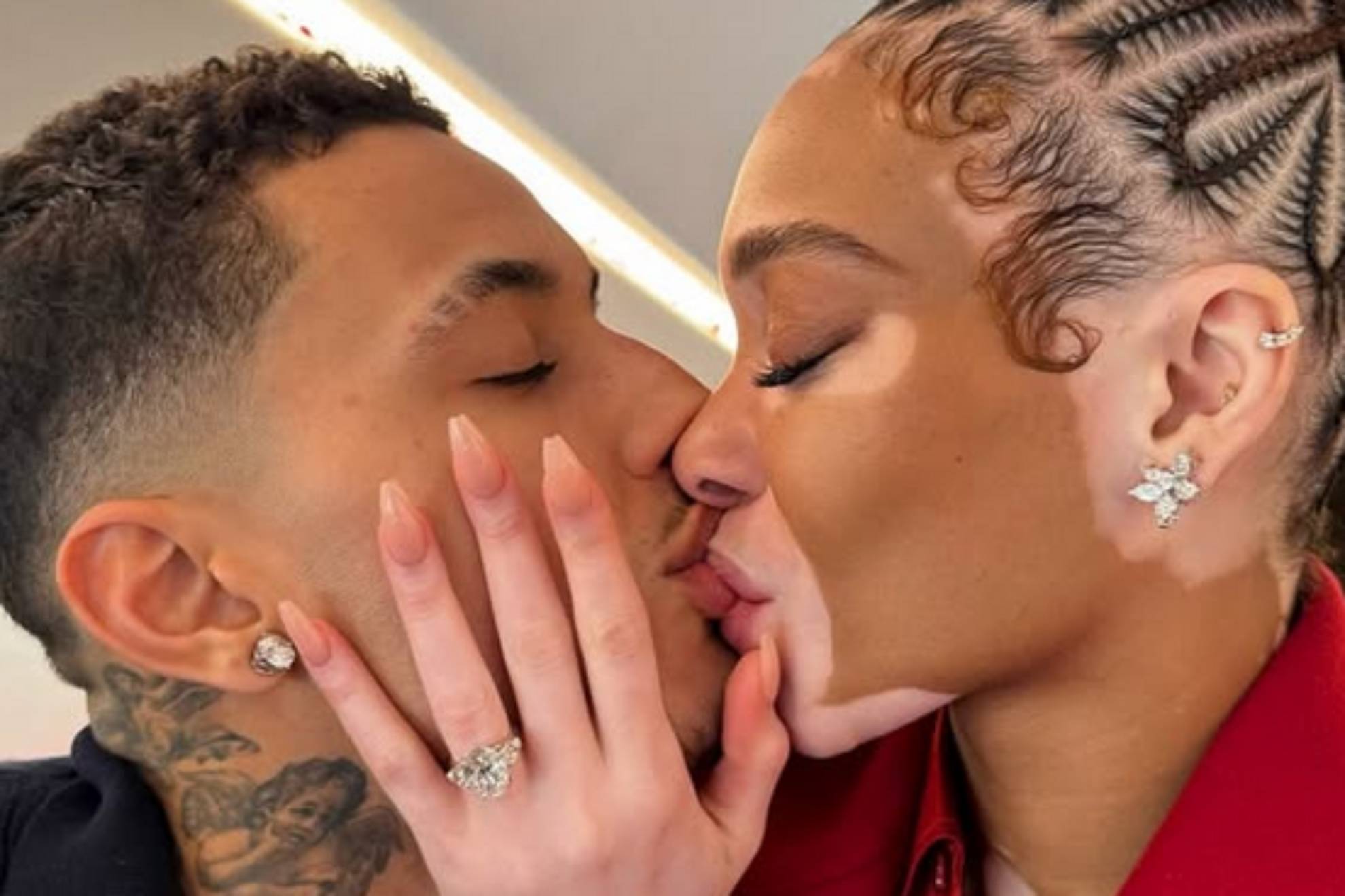 Kyle Kuzma celebra su compromiso con la famosa modelo Winnie Harlow con una canasta desde su campo