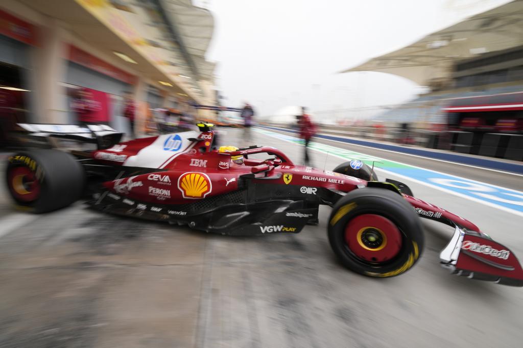 Ferrari driver Lewis Hamilton of Britain leaves the pit lane during a Formula One pre-season test at the Bahrain International Circuit in Sakhir, Bahrain, Thursday, Feb. 27, 2025. (AP Photo/Darko Bandic)