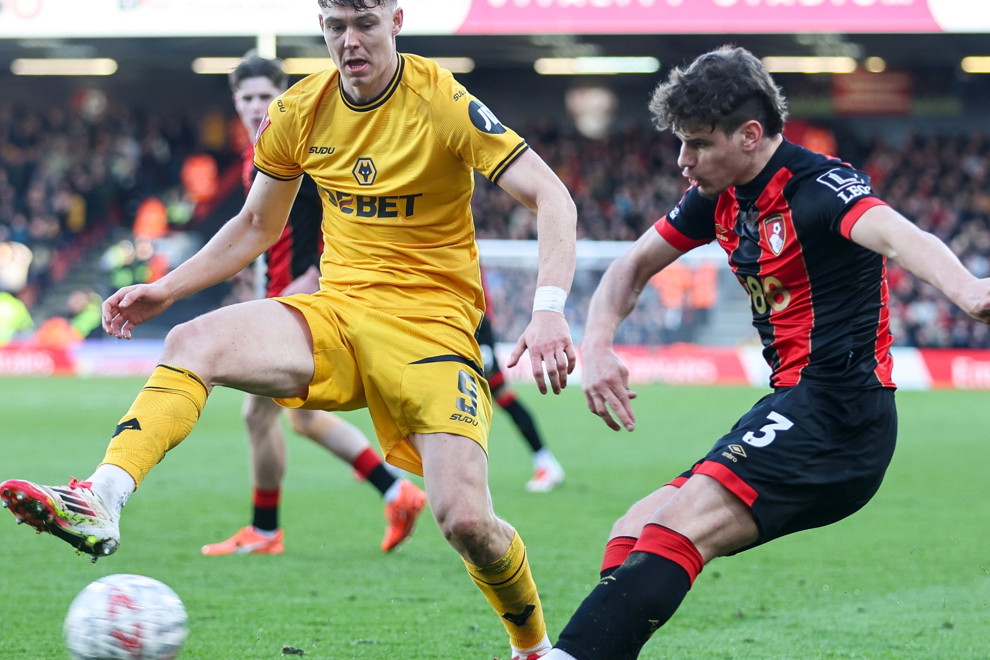 Kerkez crosses a ball in against Wolves.