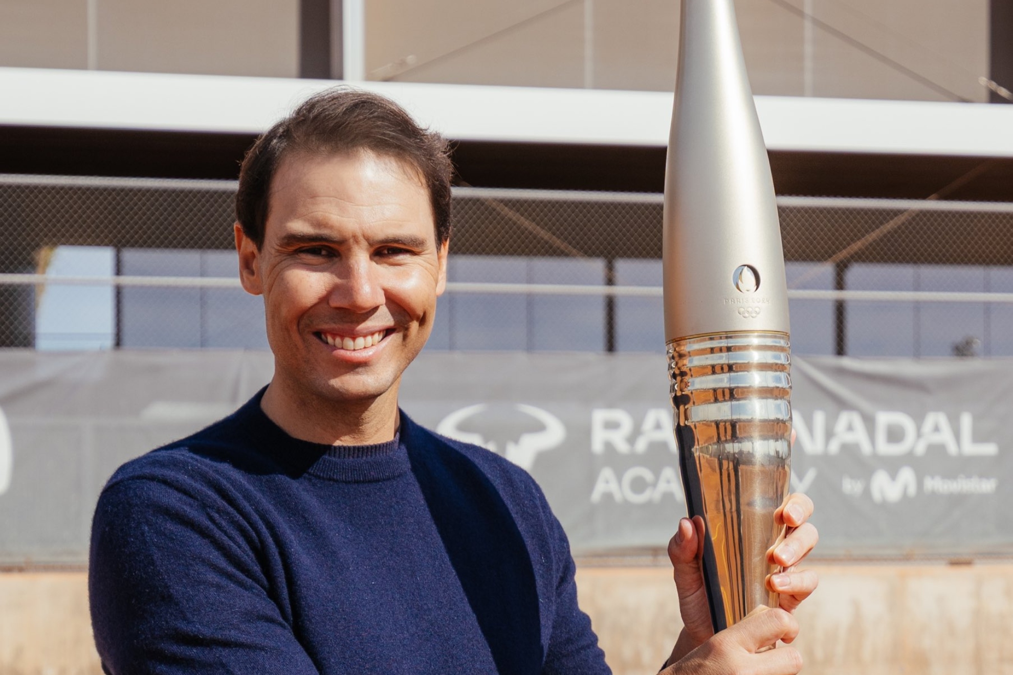 Nadal, con la antorcha de los Juegos de París.