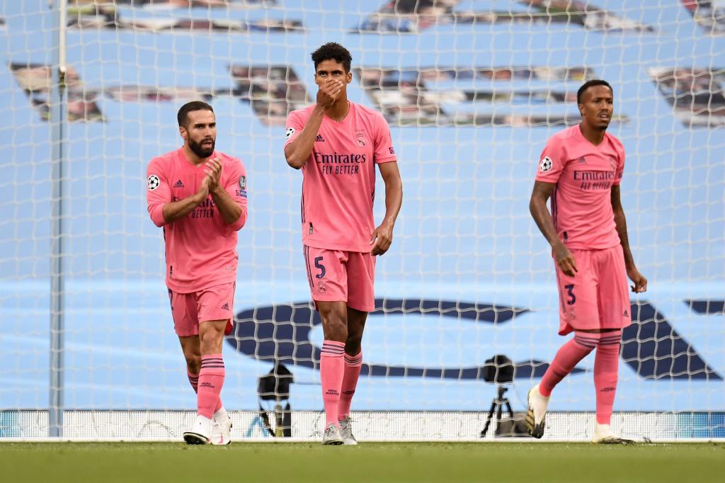 Raphael Varane of Real Madrid looks dejected after his team concede during the UEFA Champions League round of 16 second leg match. (Photo by Peter Powell/Pool via Getty Images)