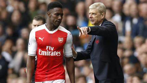 Welbeck y Wenger.