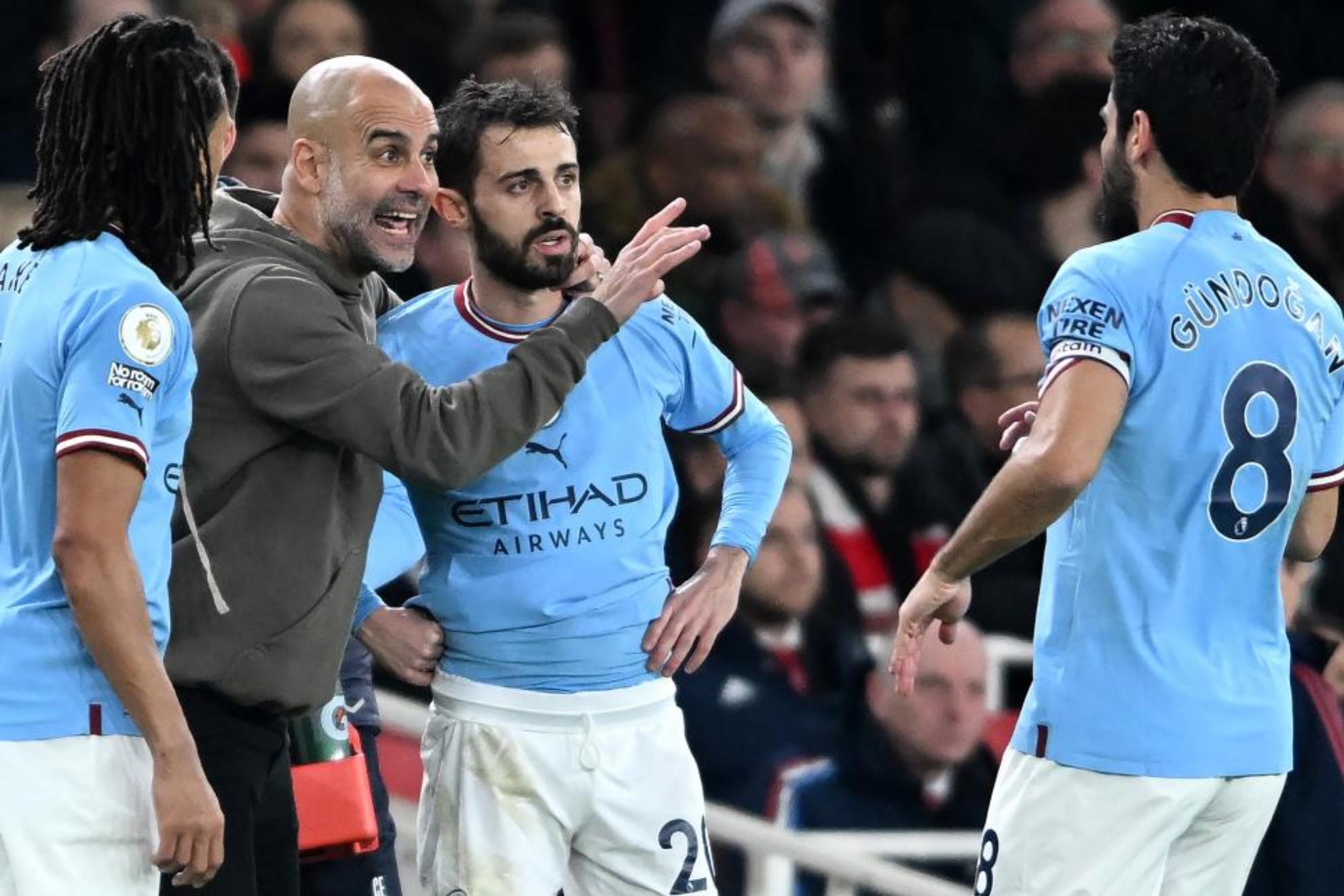 Pep Guardiola, Nathan Ake, Bernardo Silva and Ilkay Gundogan.