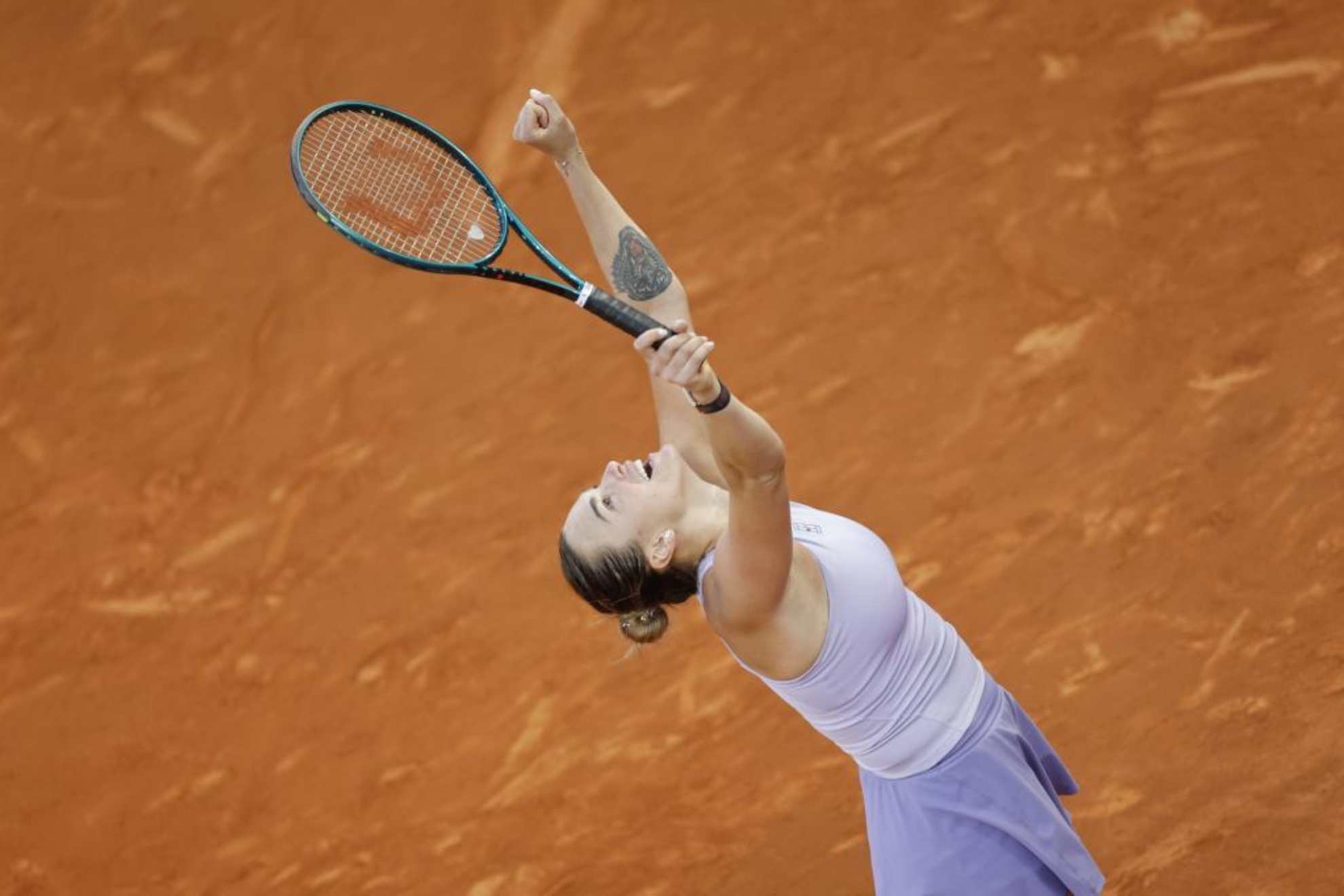 Aryna Sabalenka celebra su triunfo ante Coco Gauff en la final de Madrid