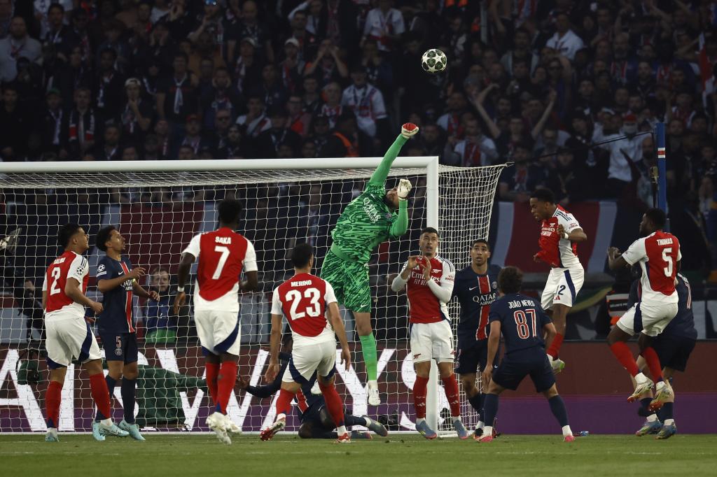 Donnarumma making a stop at the Tour of Semifinals against Arsenal