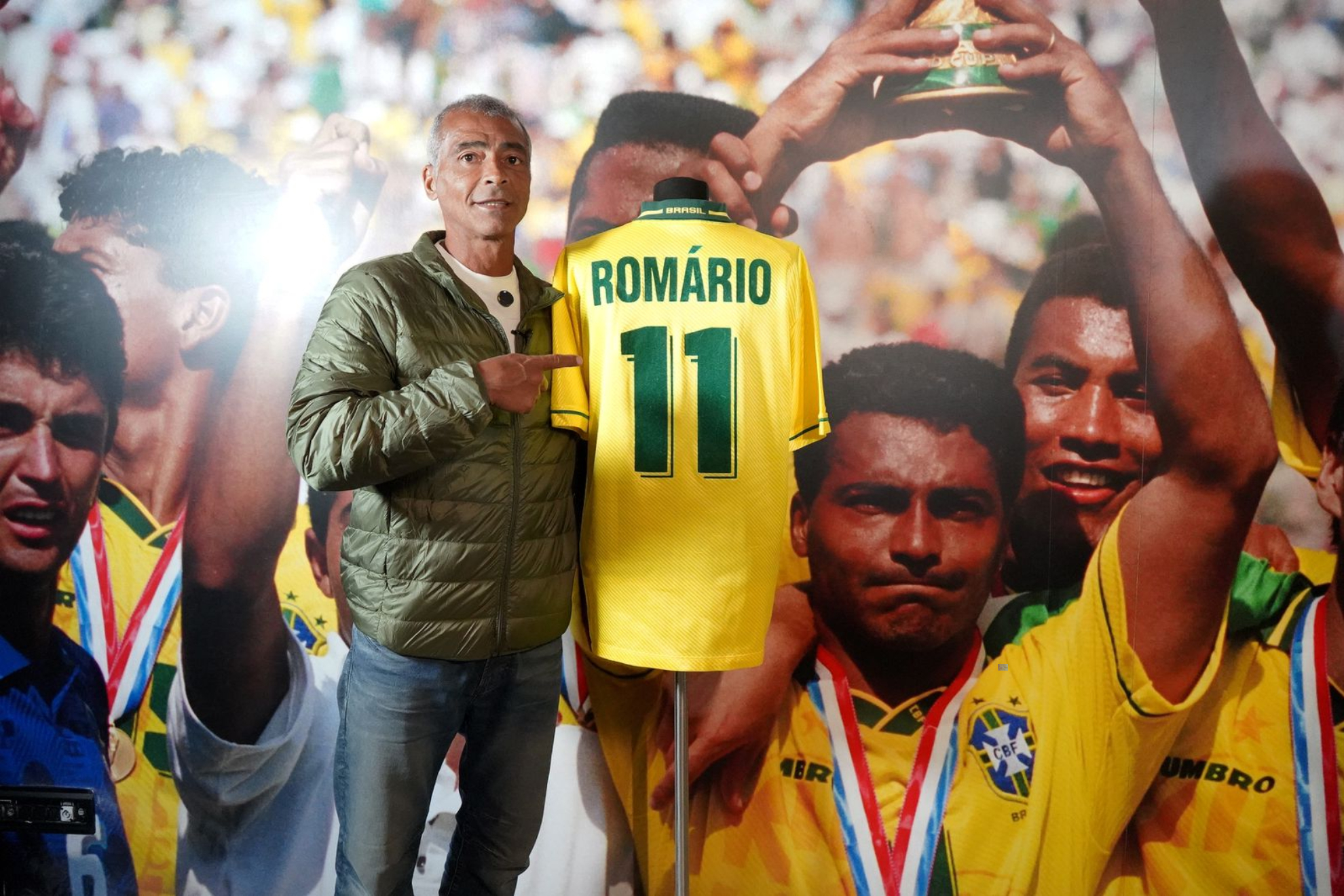 Romario, with a giant image raising the 94 cup.