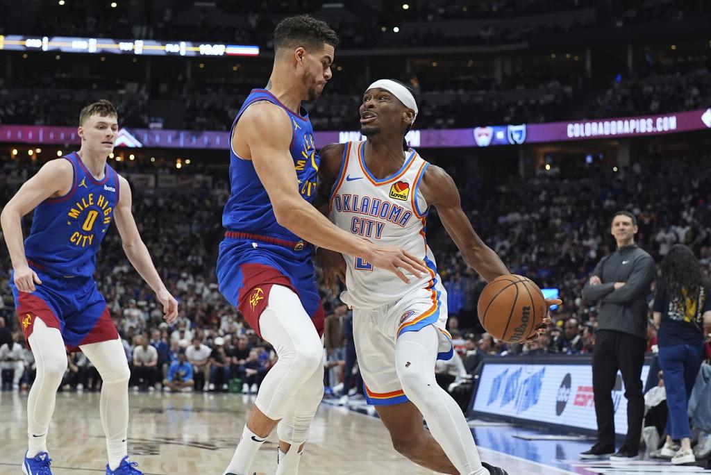 Shai Gilgeous-Alexander defendido por Michael Porter Jr.