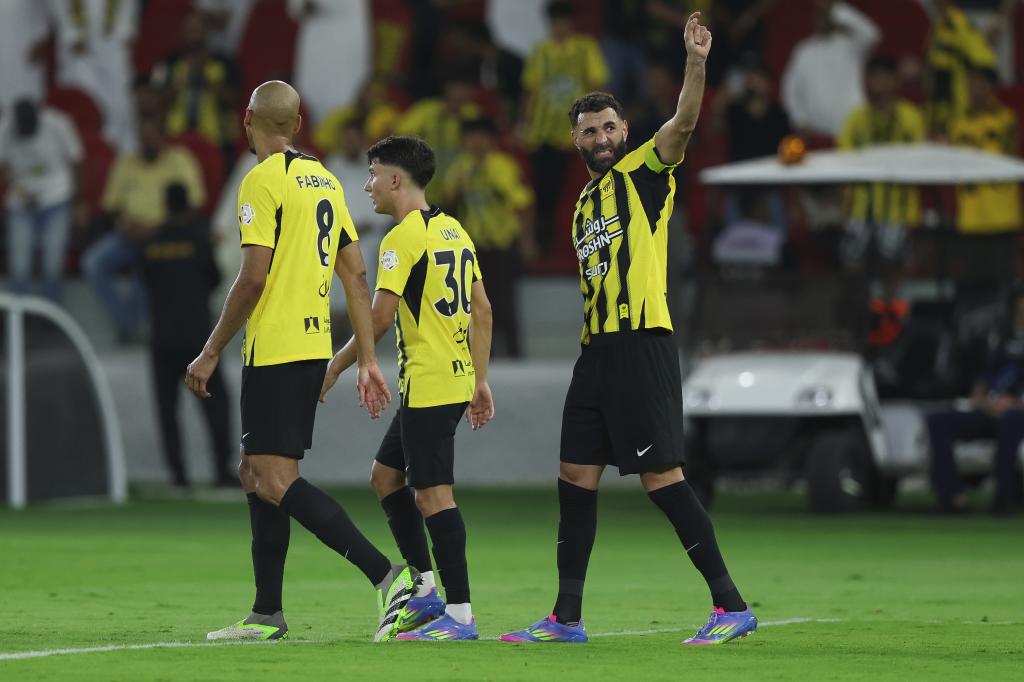 Karim Benzema celebrates a goal with Al Ittihad.