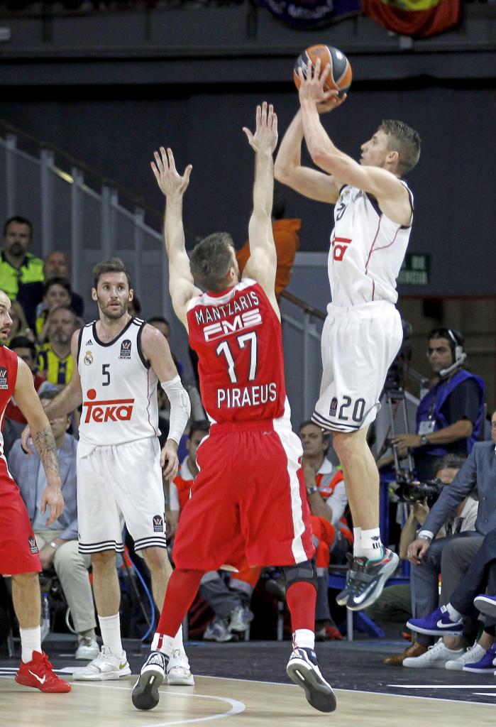 Jaycee Carroll launches a triple in the final against Olympiacos.