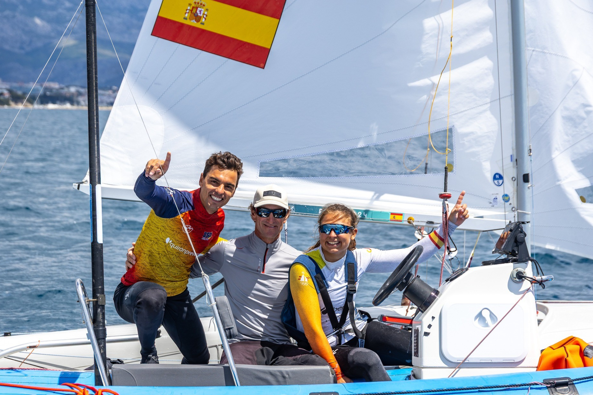 Jordi Xammar, coach Juan de la Fuente and Marta Cardona celebrate European gold.