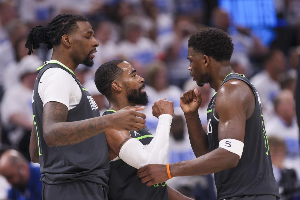 Naz Reid, Mike Conley and Anthony Edwards discuss after a Thunder basket.