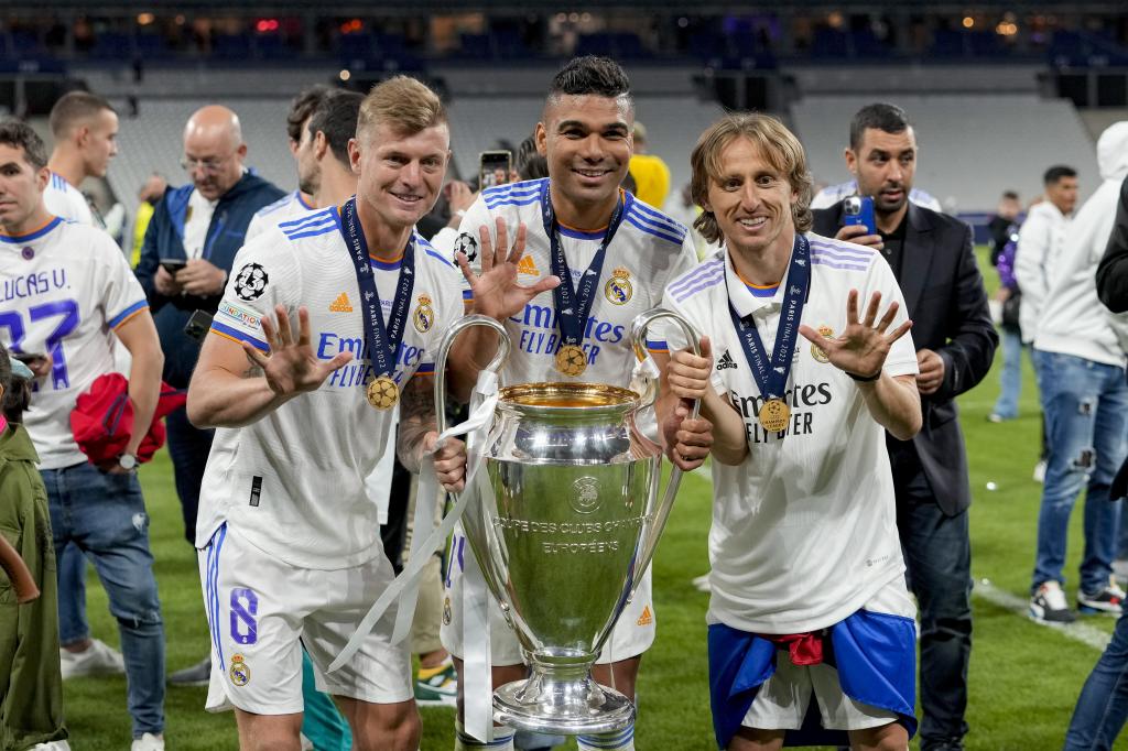 Kroos, Casemiro y Modric tras conquistar una Champions.