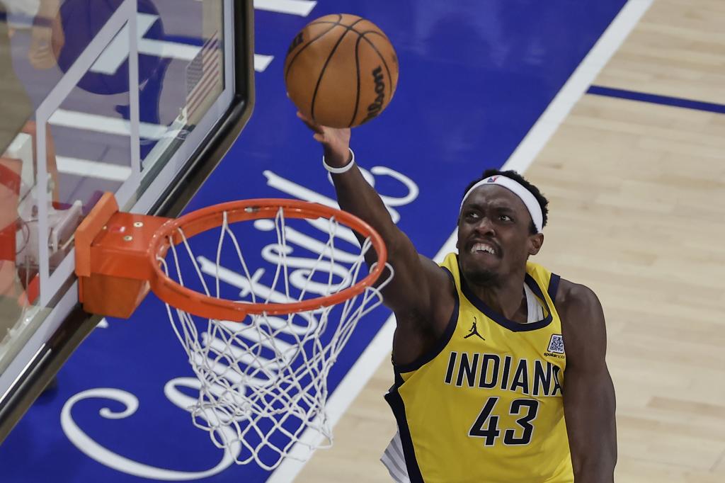 Pascal Siakam prepares to make a tray.
