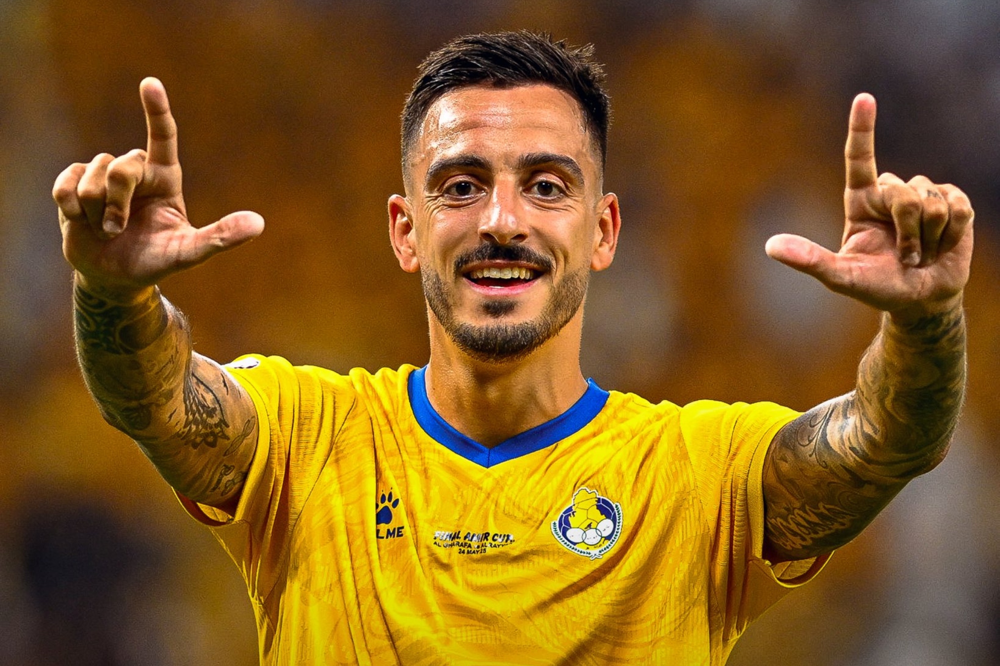 Joselu celebrates his goal.