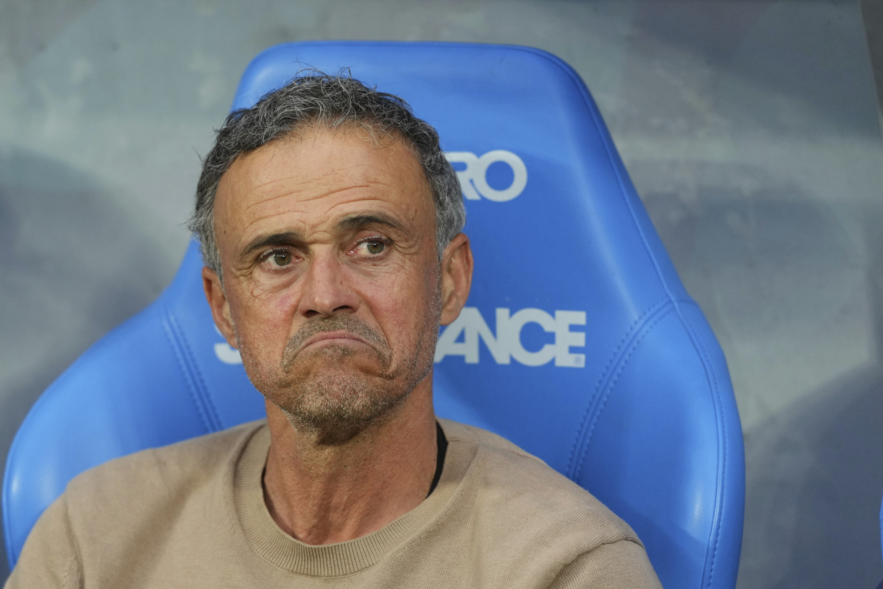 Luis Enrique, on the bench.