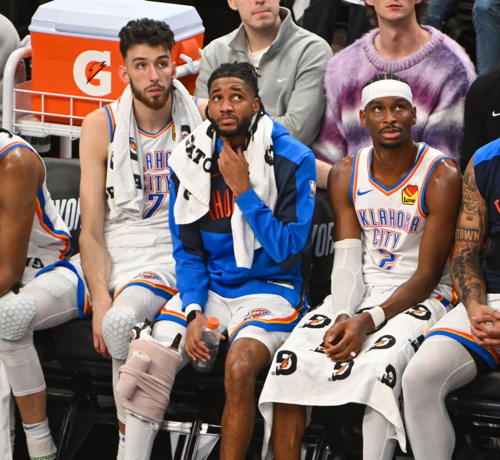 Holmgren, Joe and Gilgeous-Alexander look incredulous from the bench.