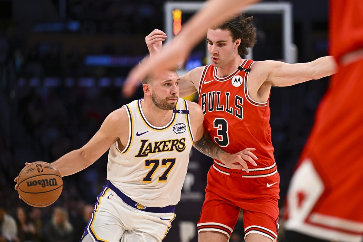 Luka Doncic, defended by Josh Giddey in a Lakers-Bulls this season.