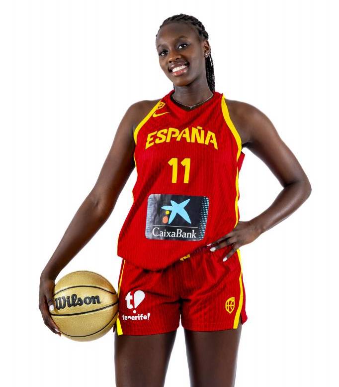 Awa Fam poses in an official photo shoot from the women's team.