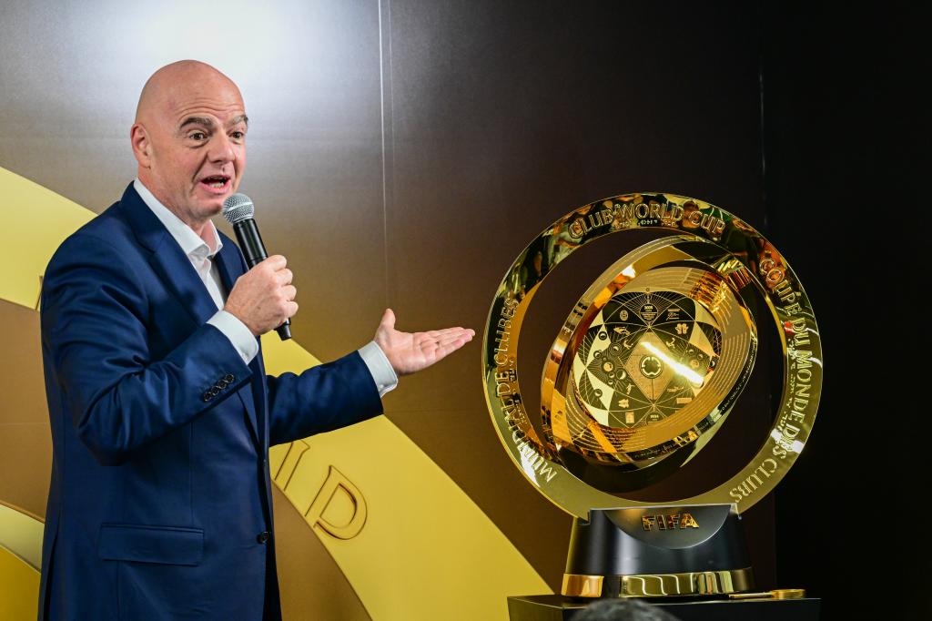 The president of FIFA, Gianni Infantino, speaks next to the Club World Cup trophy, during an event this Tuesday, in Miami. EFE/ Giorgio Viera