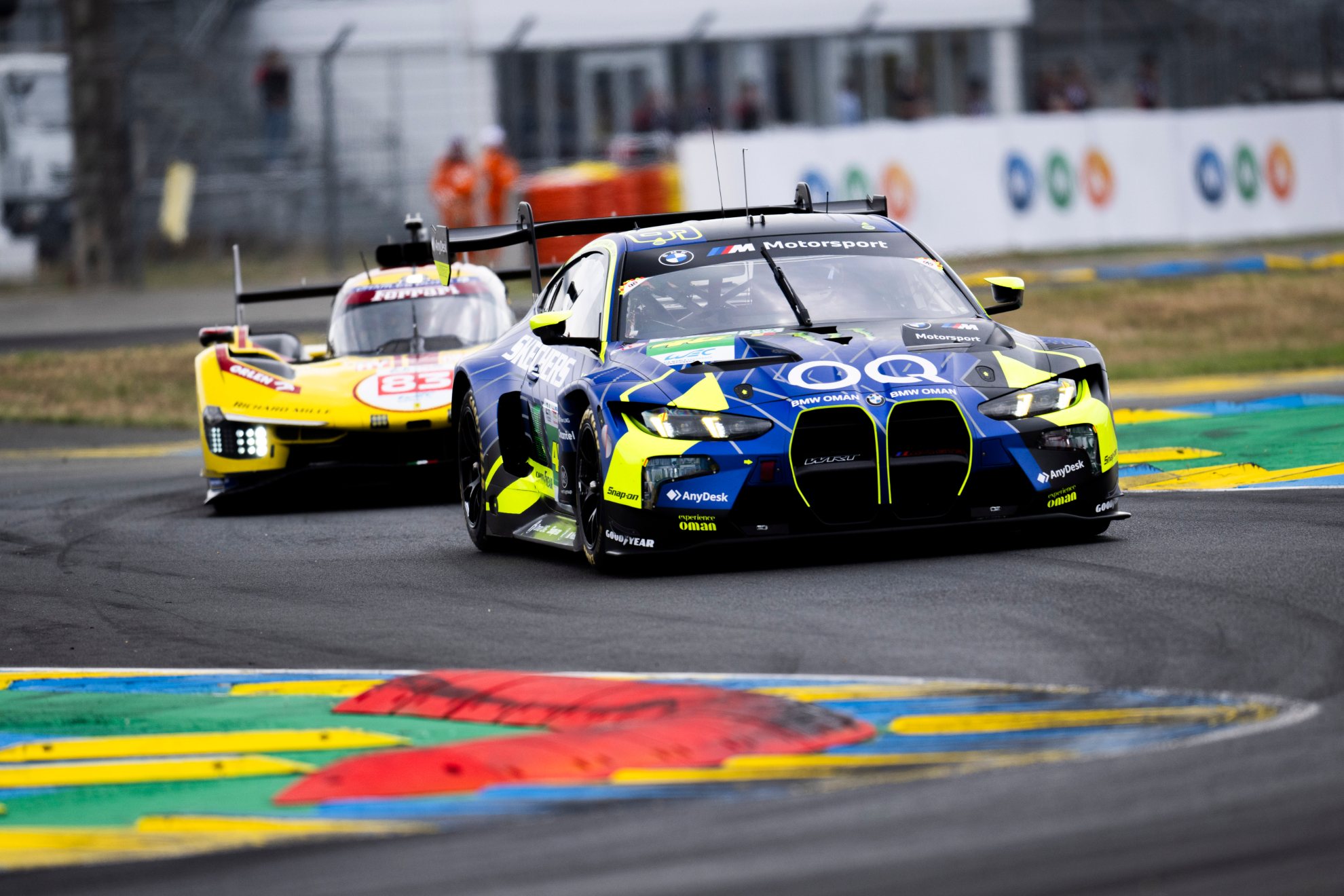 Rossi and his BMW #46 leads the LM GT3 category at dusk.