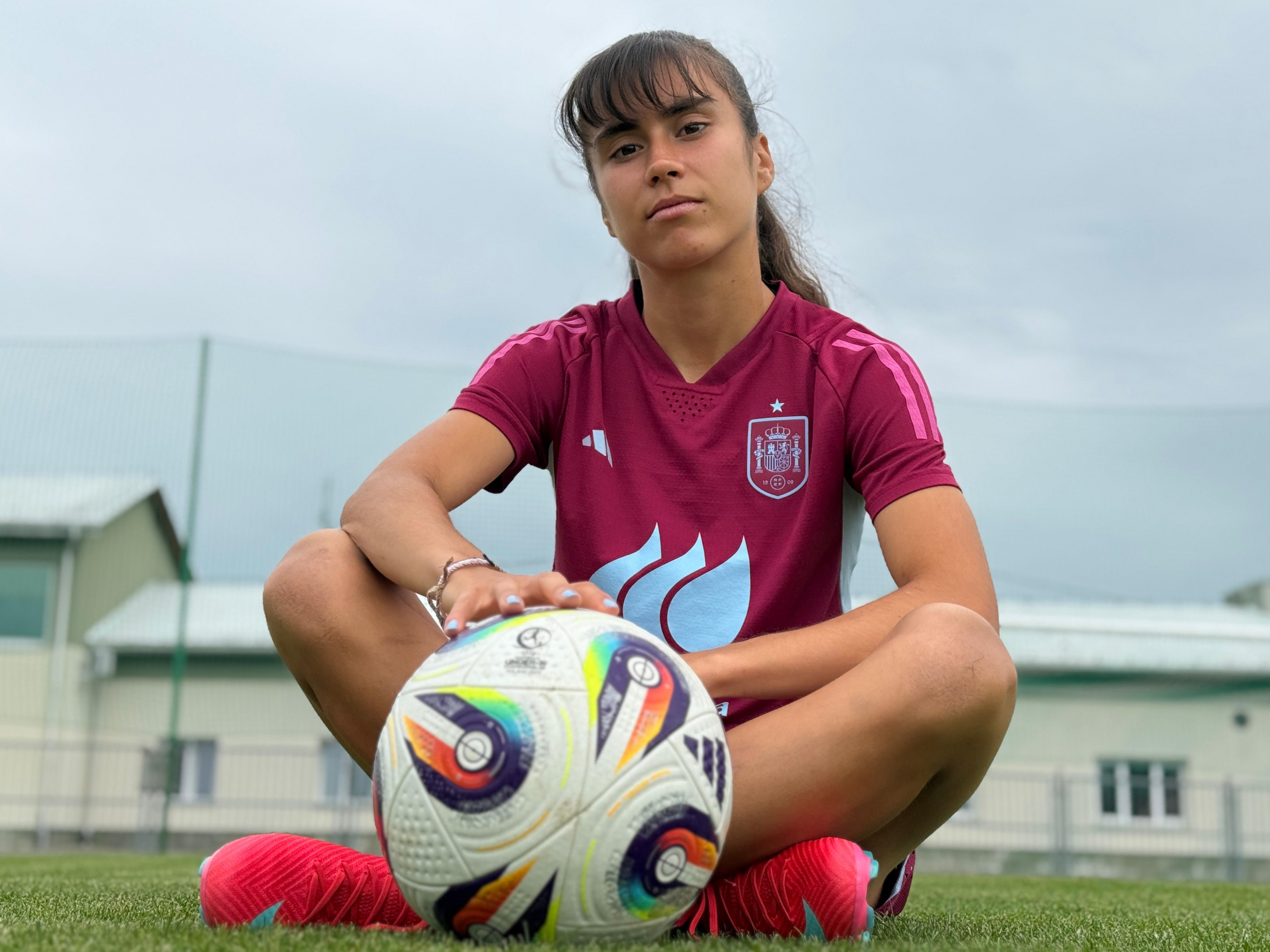 Cris Libra posing with a ball