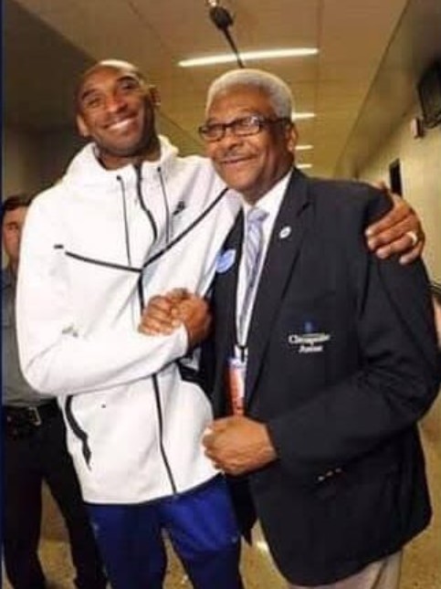 ? Coach Mack 'with Kobe Bryant the day he asked to take a picture with him.