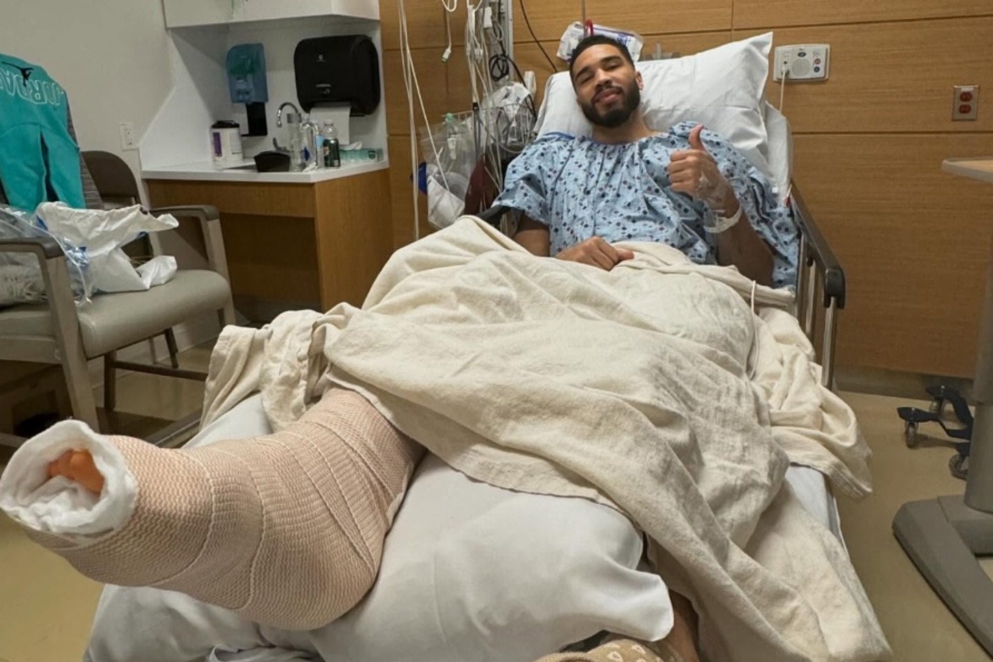 Tatum, in the hospital, recently operated on his tear in Achilles.