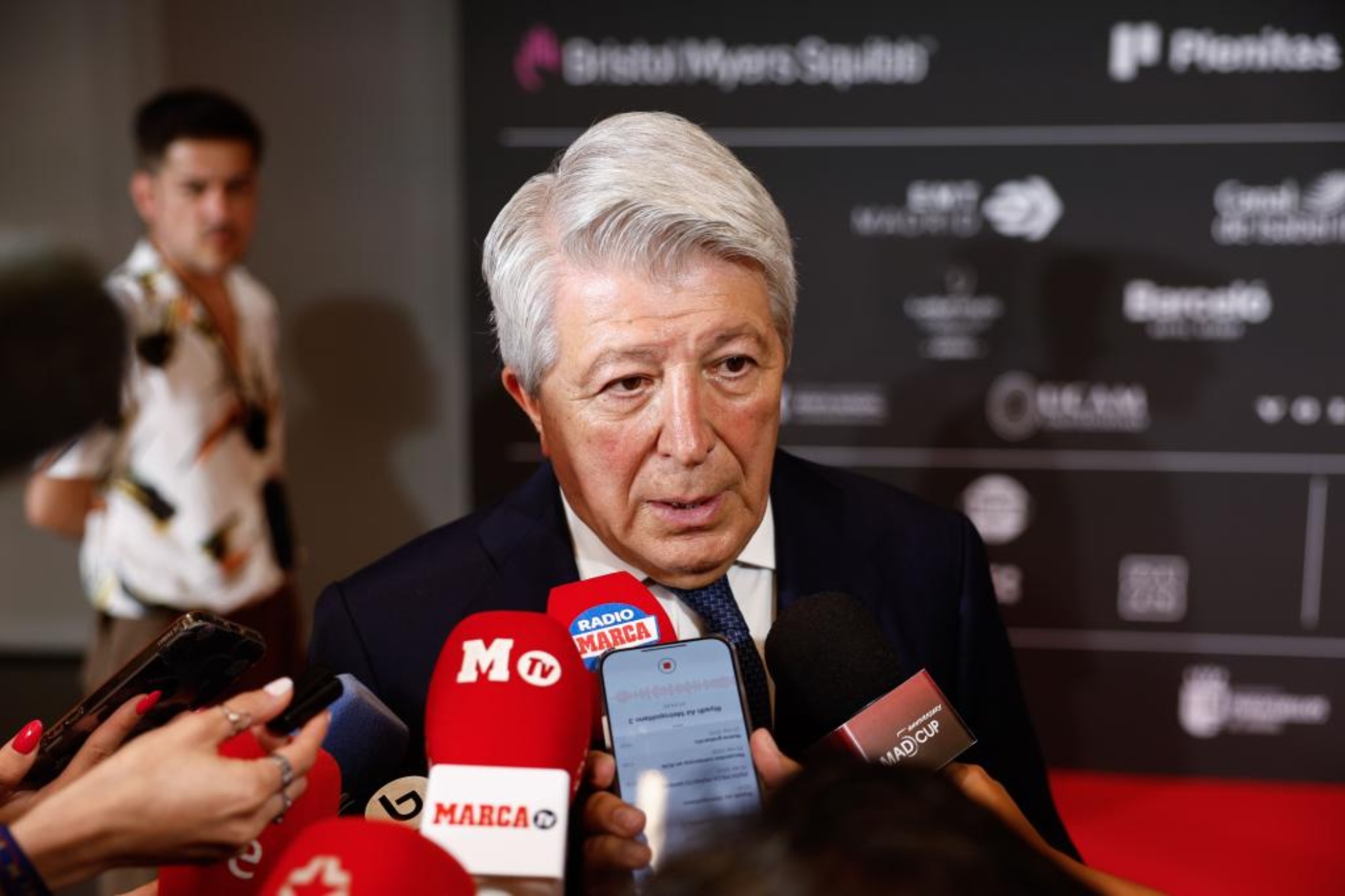 Enrique Cerezo, attending to the media.