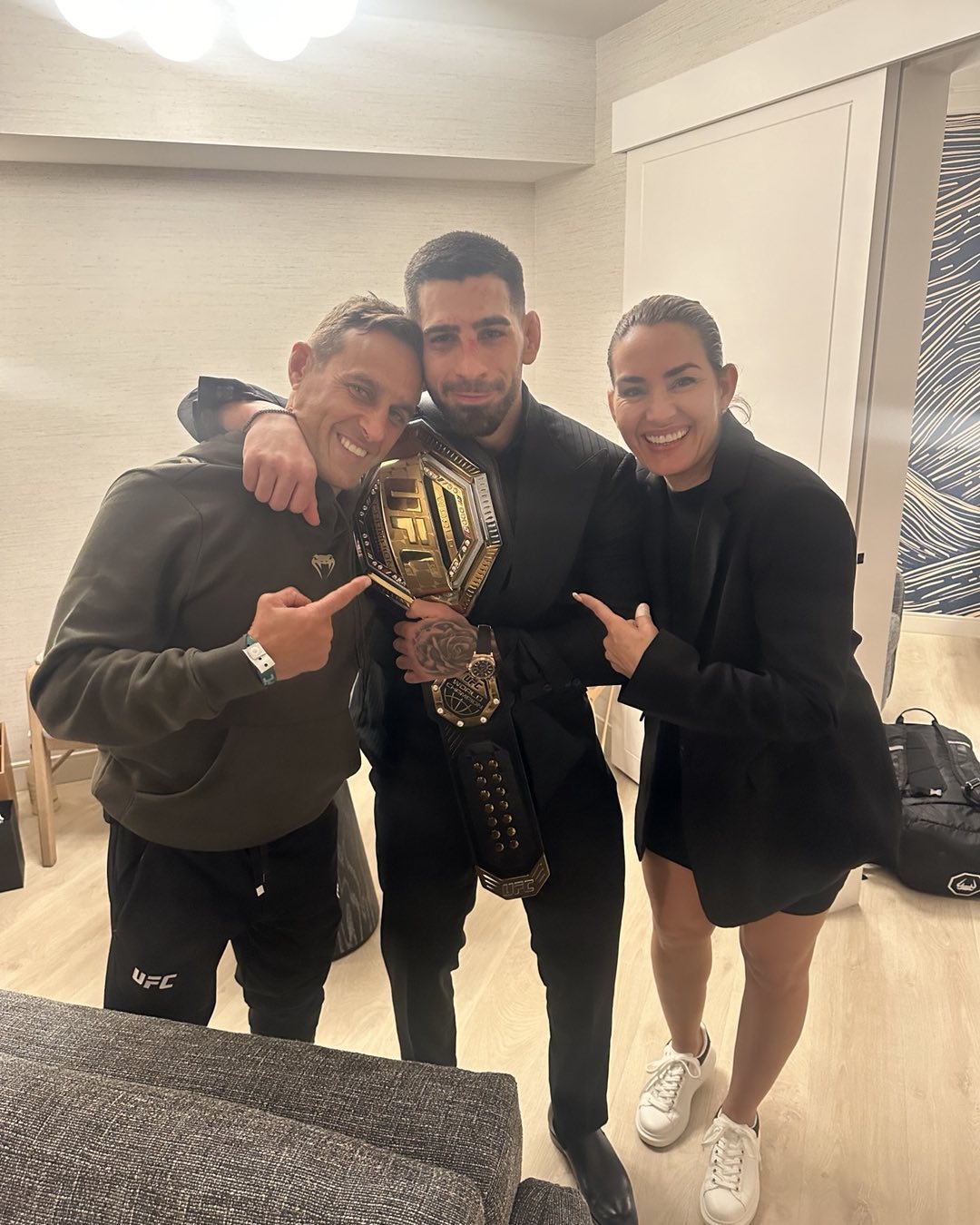 Jesús Gallo, next to Ilia Topuria after being crowned in UFC 298 vs Volkanovski.