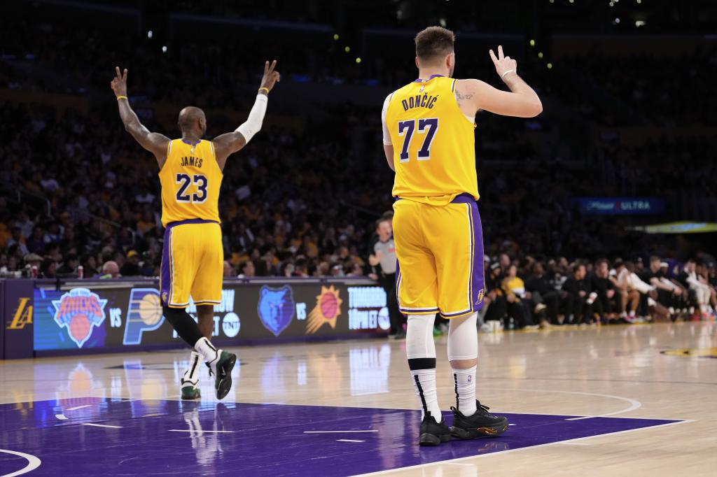 LeBron James and Luka Doncic, during a Lakers match.
