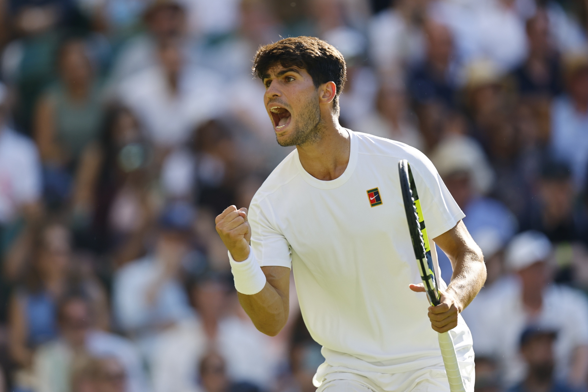 Alcaraz celebra un punto ante Struff.