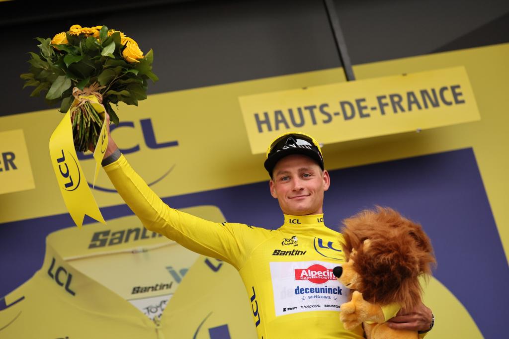 Van der Poel, yellow on the podium.