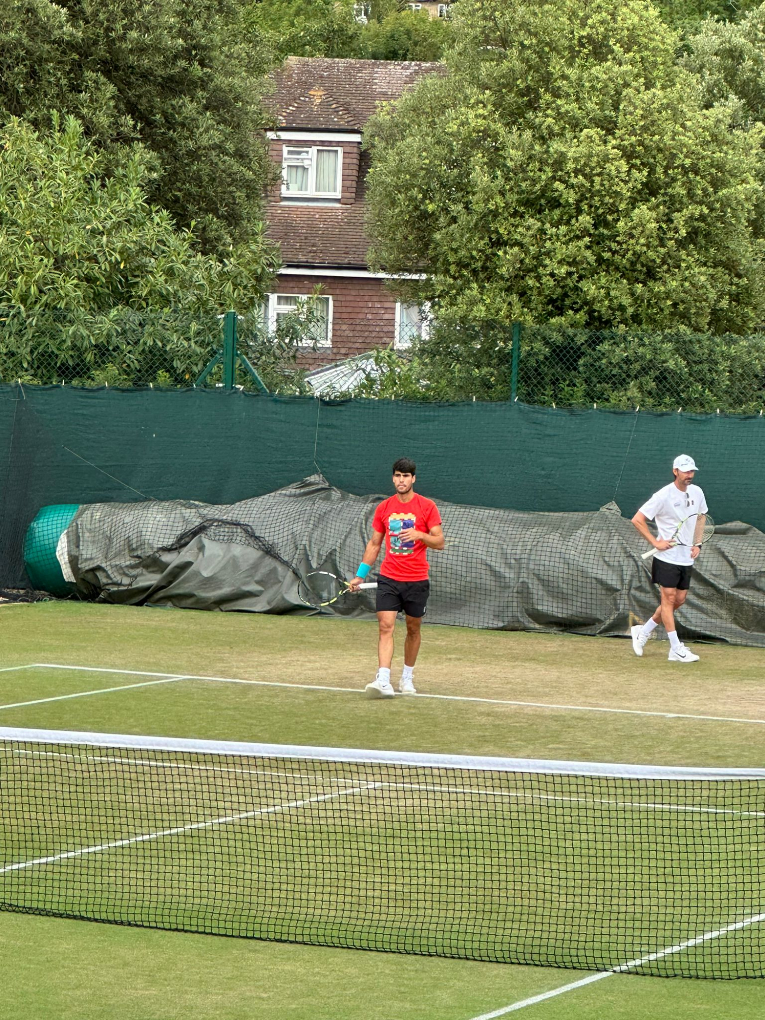 Alcaraz entrena junto a Ferrero en Aorangi, este domingo.