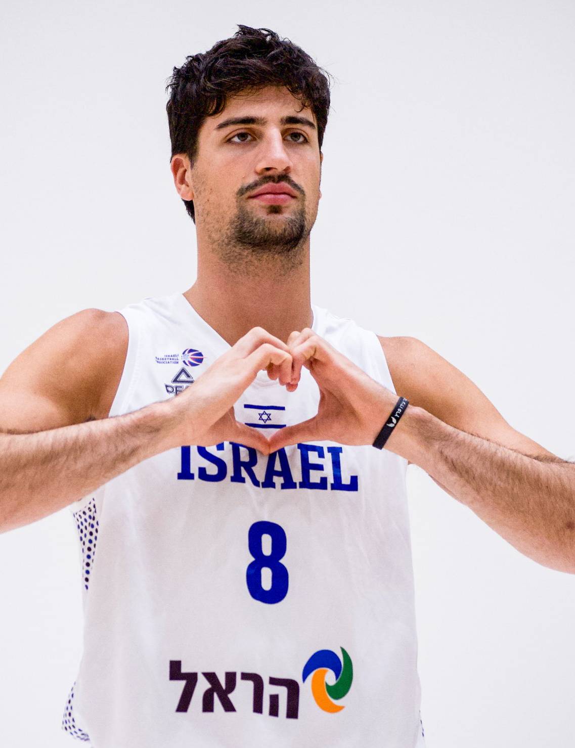 Deni Avdija, in an official photo shoot with the Israel team.