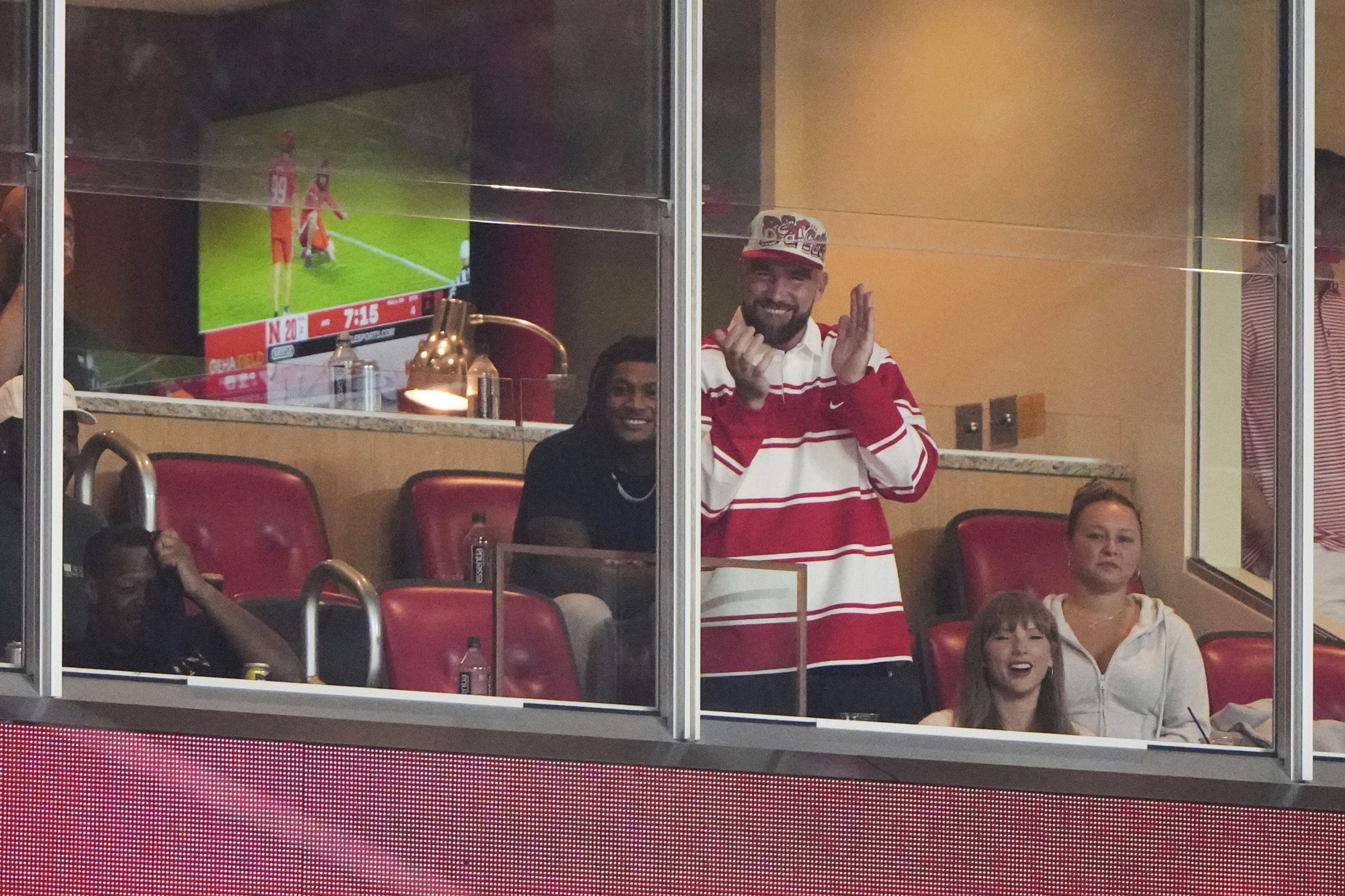Kelce and Swift, in one of their last appearances in the Arrowhead box to see an NCAA match.